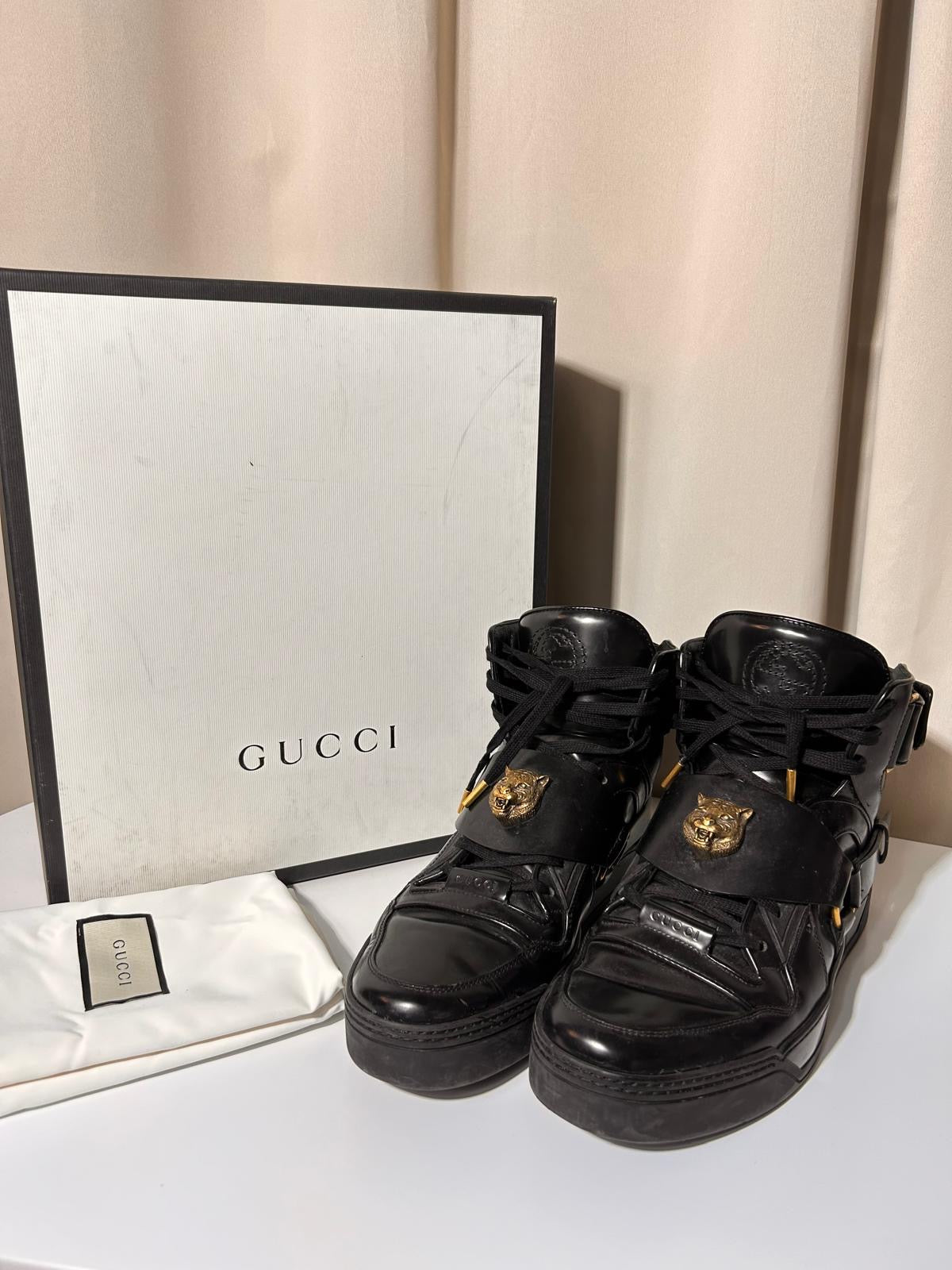 Sneakers Gucci noires cuir avec boîte et dustbag – Taille 43 homme – Seconde main Héritage du Luxe
