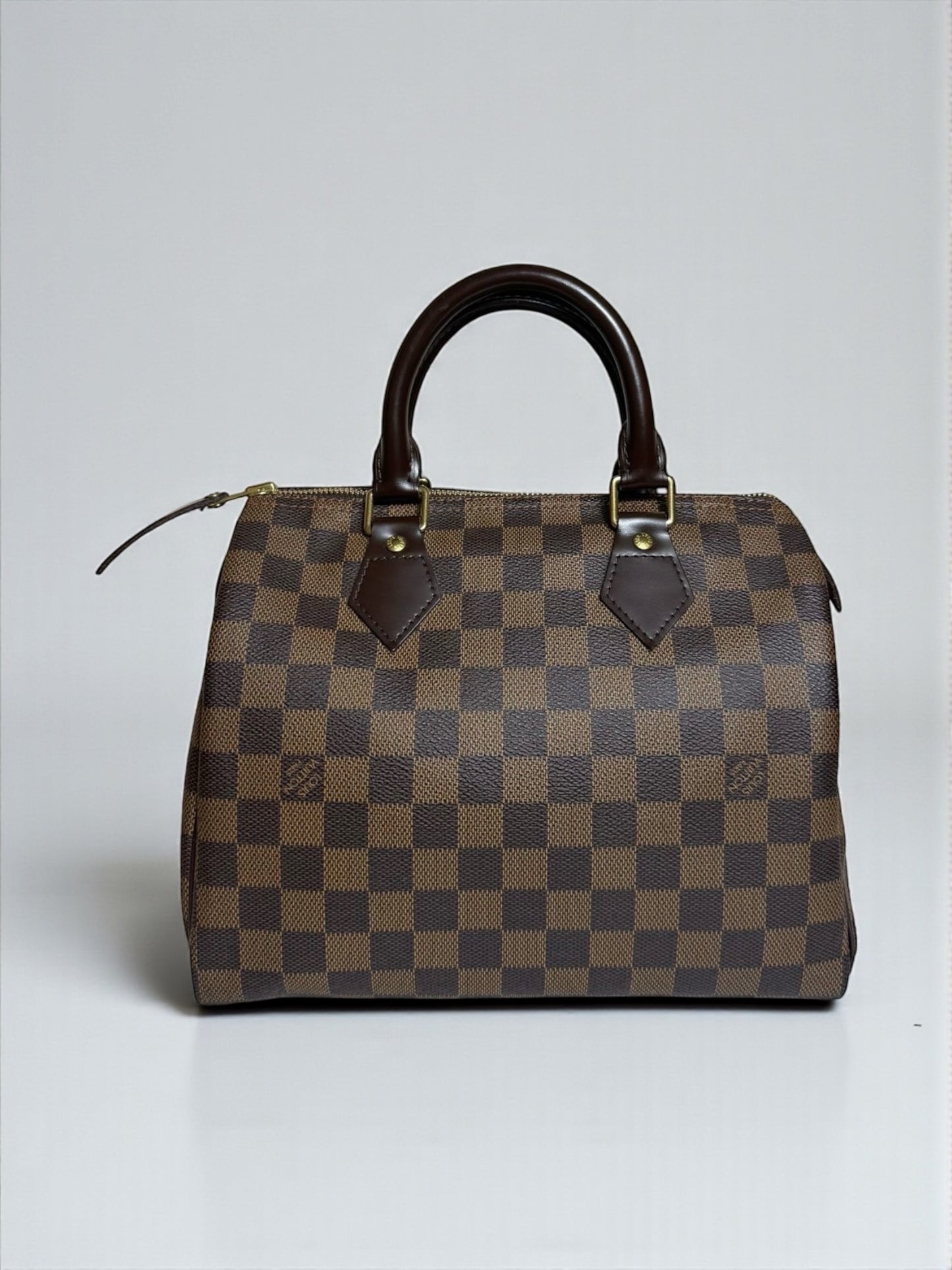 Louis Vuitton Speedy 25 Damier Ébène – sac vintage d’occasion en parfait état, cuir marron et toile Damier, cadenas et clés – Héritage du Luxe.