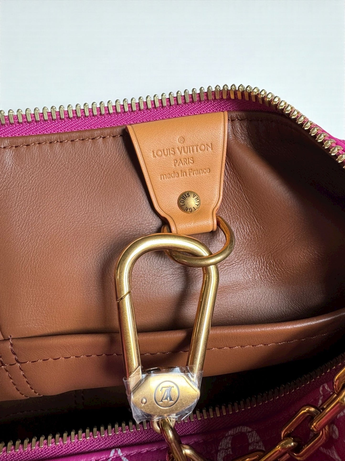 Sac Louis Vuitton Speedy P9 Bandoulière 40 Rose Agate signé Pharrell Williams, en cuir de veau souple, neuf full set avec accessoires et boîte.